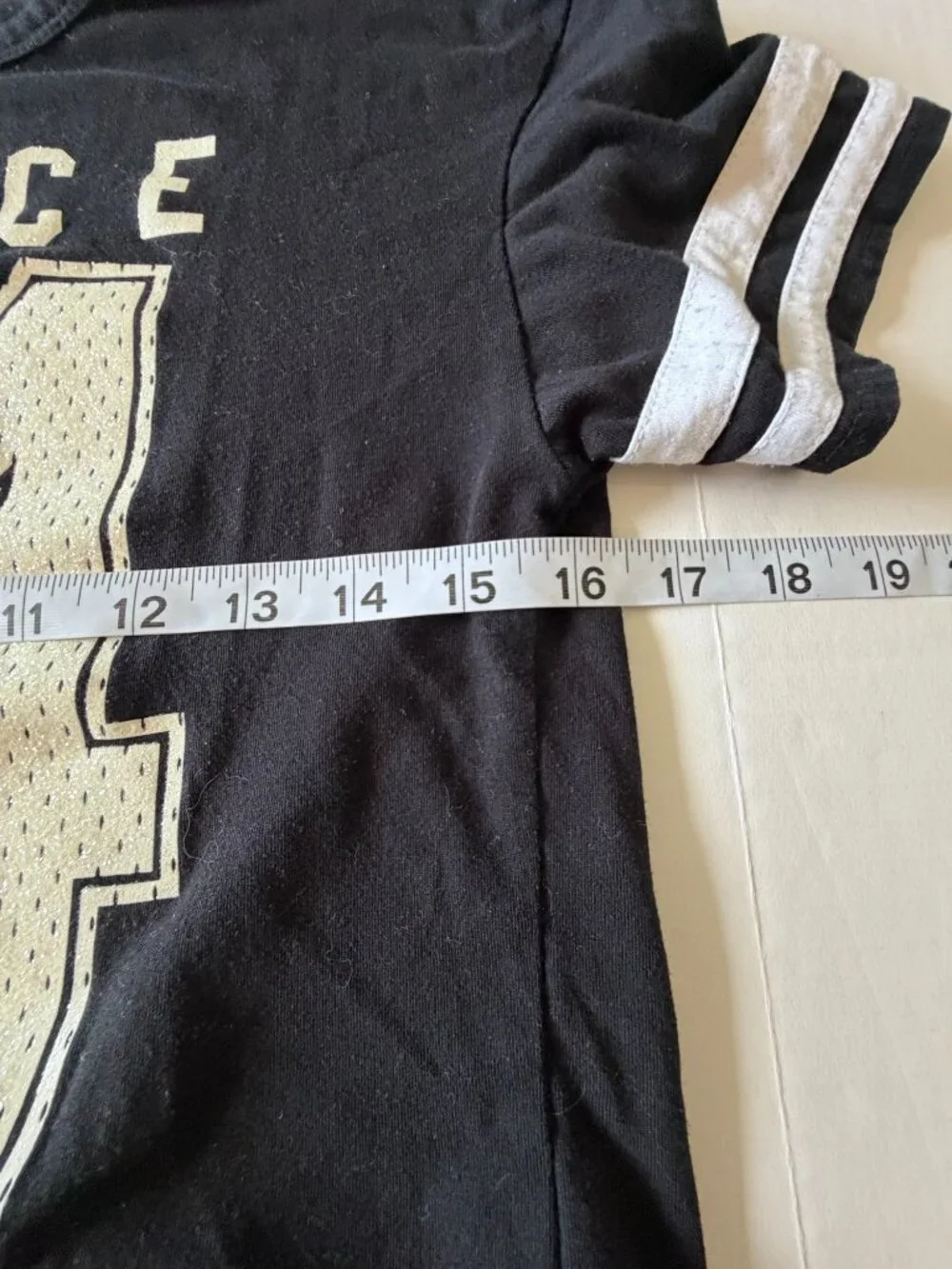 Justice black cropped short sleeve t-shirt, iridescent logo and numbers, Medium